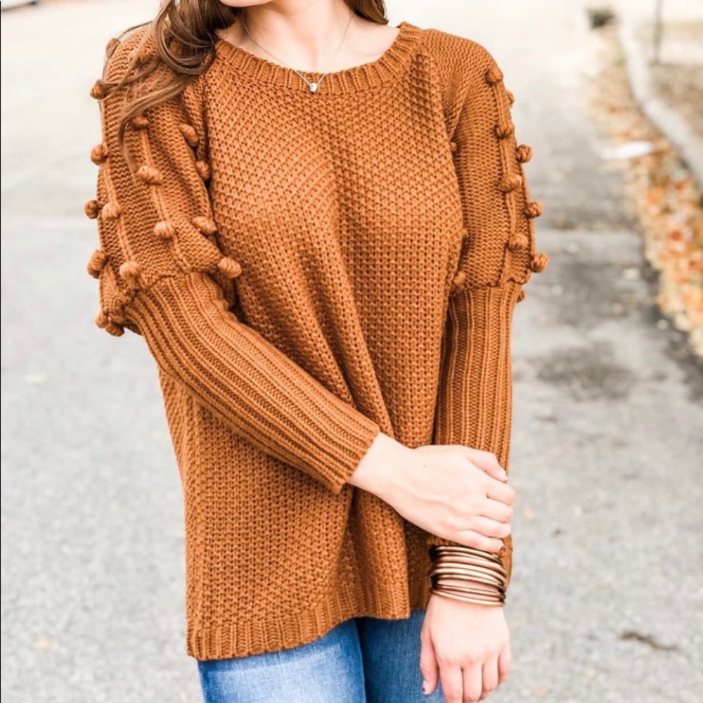 Pomp and circumstance puff sleeve sweater